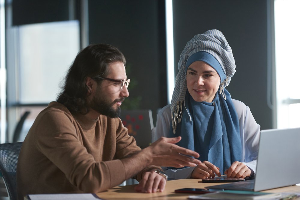 From Concept to Reality: How a Branding Agency Shapes Your Brand business colleagues working in team