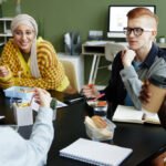 Top 10 Reasons to Hire a Branding Agency for Your Business Growth young team at lunch break